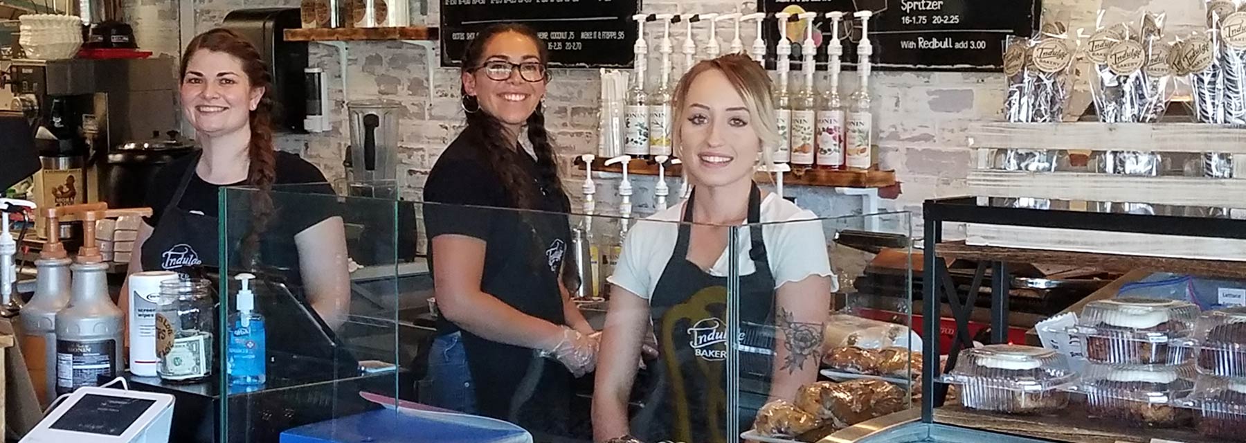 3 females working in a bakery